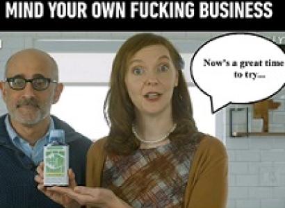 Bald man with glasses next to a young white woman holding a medicine bottle with a balloon quote saying Now's a great time to try... and at the top the words "Mind you own fucking business"