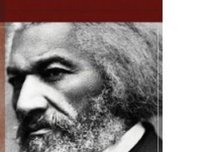 Book cover with rust colored top and black and white photo of Frederick Douglass below, with title of book