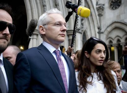 Man walking down stairs with media all around