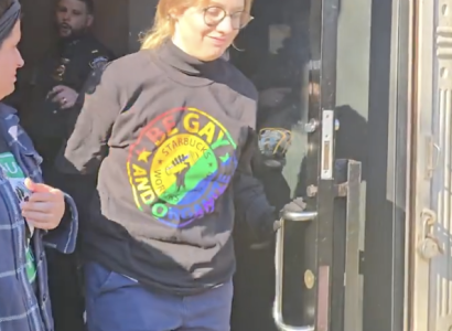 Young woman being arrested