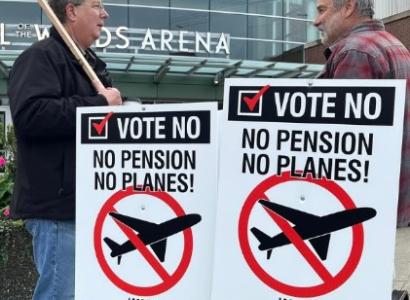 Men holding strike signs