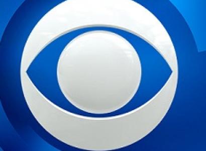 White image of a round circle with an oval around it and blue in the background