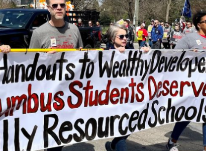 People holding banner in a march