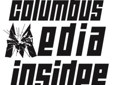 Black letters Columbus Media Insider with the M looking like cracked glass