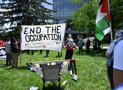 End the occupation banner
