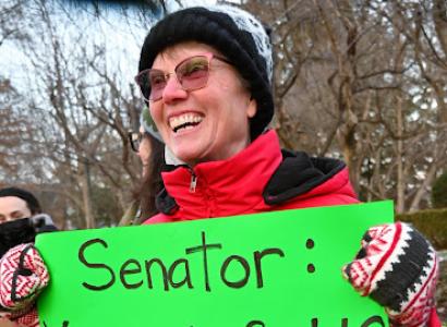 Protestor holding sign