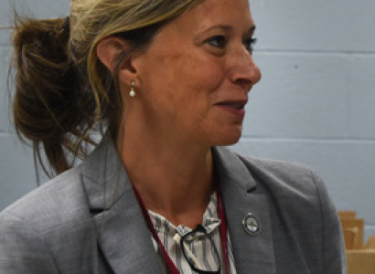 White woman with her hair pulled back
