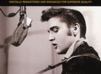 Young Elvis Presley singing into a mic