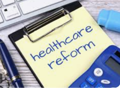 Clipboard saying healthcare reform