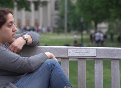 Photo from Hunting Ground - girl sitting alone and sad on porch