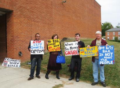 Protesters outside the October 1 public meeting asked: Where is Andrew Ginther?