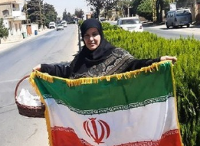 Woman holding Iranian flag