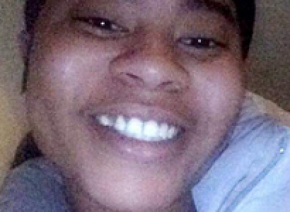 Close up of young black woman smiling