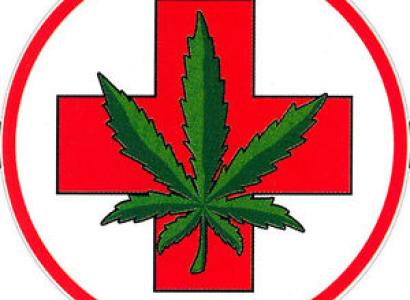 Marijuana leaf on top of a health cross symbol