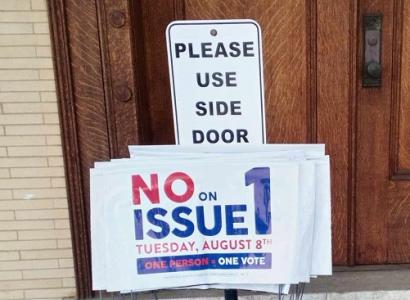 Yard signs on porch