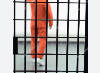 Prisoner behind bars