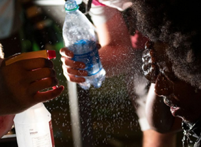 Giving water to protester