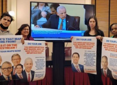 People holding signs