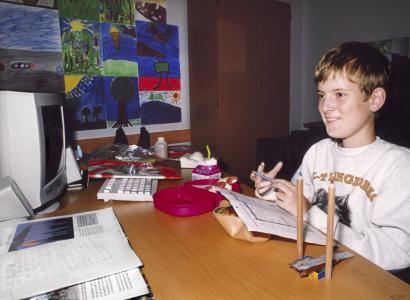 Boy at a desk gaming