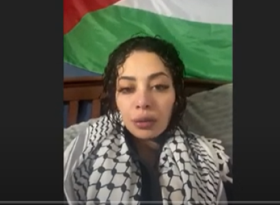 Palestinian woman and flag