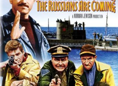Movie poster of the Russians are coming with lots of guys coming off a ship like they are Russians menacing the US