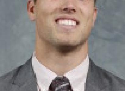 Photo of smiling guy in a suit