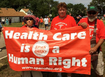People with sign Health Care is a Human Right