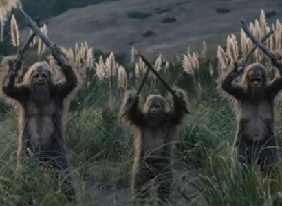 Three Sasquatches holding sticks in the air