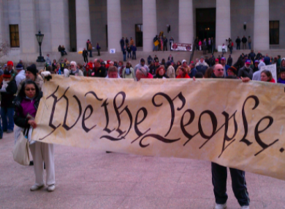 Sign saying We The People