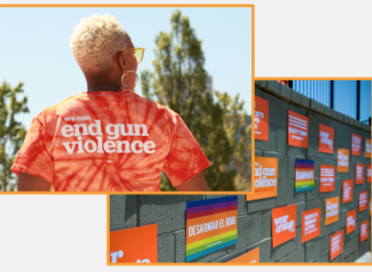 Woman wearing Wear Orange shirt and posters