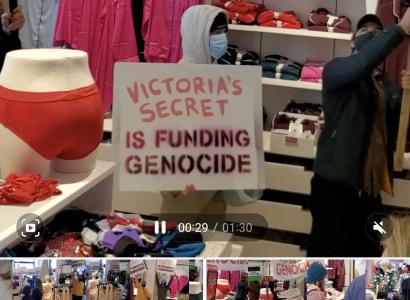 Sign saying VIctoria's Secret is funding genocide
