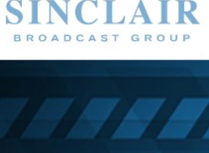 Blue design with sideways rectangles at the bottom and words Sinclair broadcast group at the top