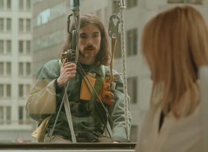 Window washer outside a window