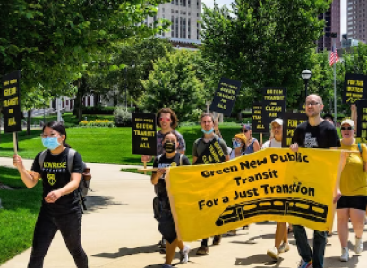 People marching for mass transit