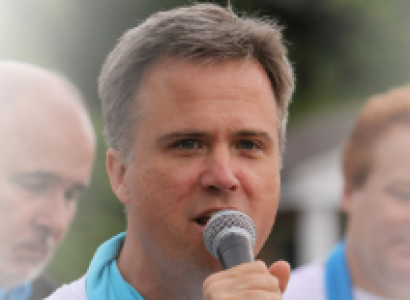 David talking into a mic