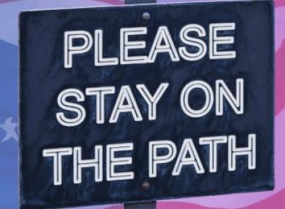 Sign says Please Stay on the Path