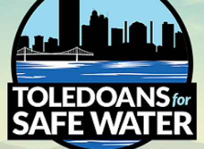 Skyline in a circle and the words Toledoans for Safe Water