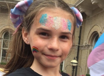 Young girl with trans flag