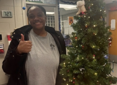 Woman by a Xmas tree