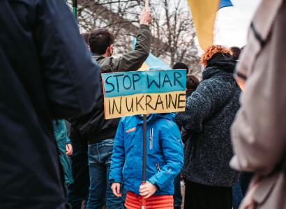 Child with sign Stop War in Ukraine