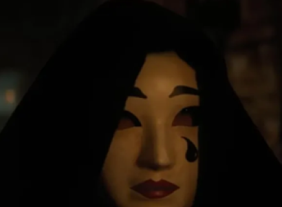 Face with white makeup and a tear on the cheek