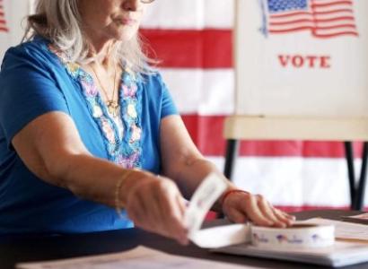 Older white woman voting