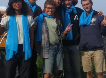 People posing with anti-war T-shirts