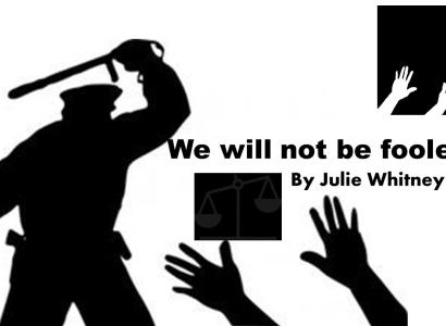 Image of cop beating someone