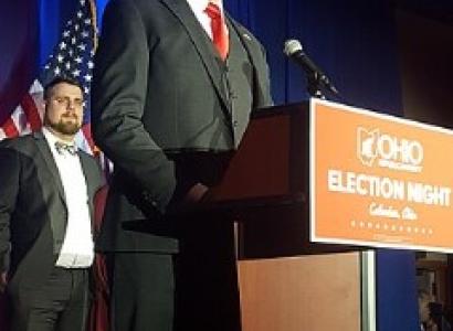 Attorney General of OH Yost at a podium