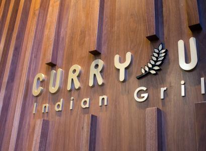 Curry Up sign