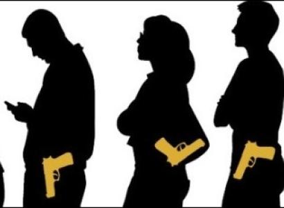 Silhouettes of people all carrying guns