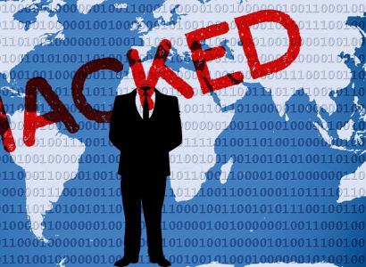 The world behind a guy who looks like Trump with the words HACKED