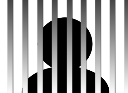 A black figure behind gray bars like a jail cell