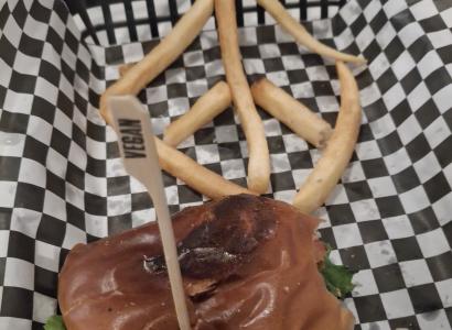 Black bean burger and fries in the shape of a peace sign